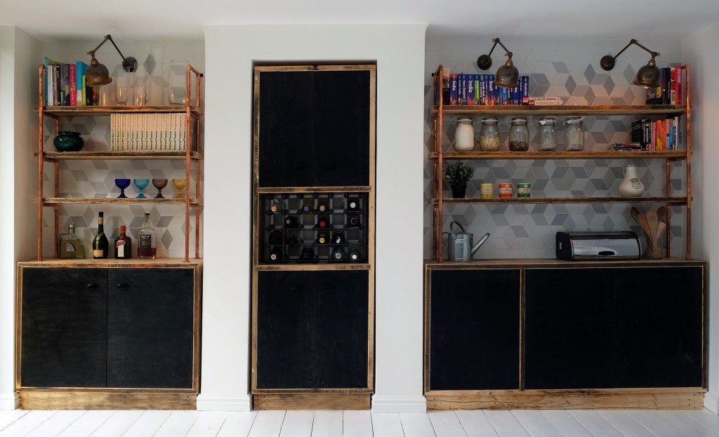 Industrial wall lights in this vintage kitchen in London