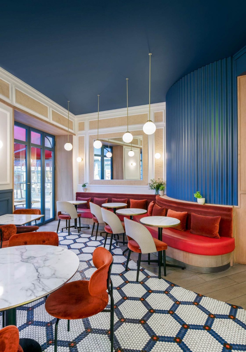 Hanging globe pendant over dining area