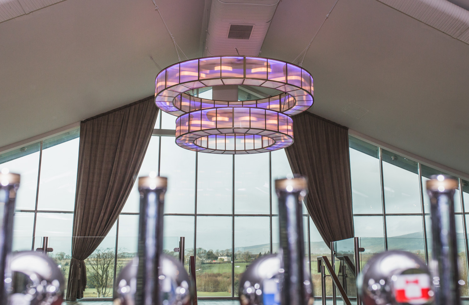 We manufactured this 3-metre double ring chandelier for the Foyle Golf Centre