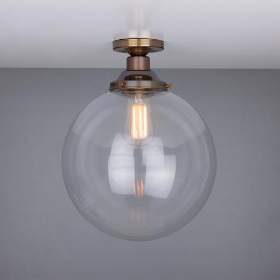 Riad Clear Glass Globe Flush Ceiling Light 30cm, Antique Brass