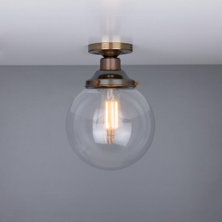 Riad Clear Glass Globe Flush Ceiling Light 20cm, Antique Brass