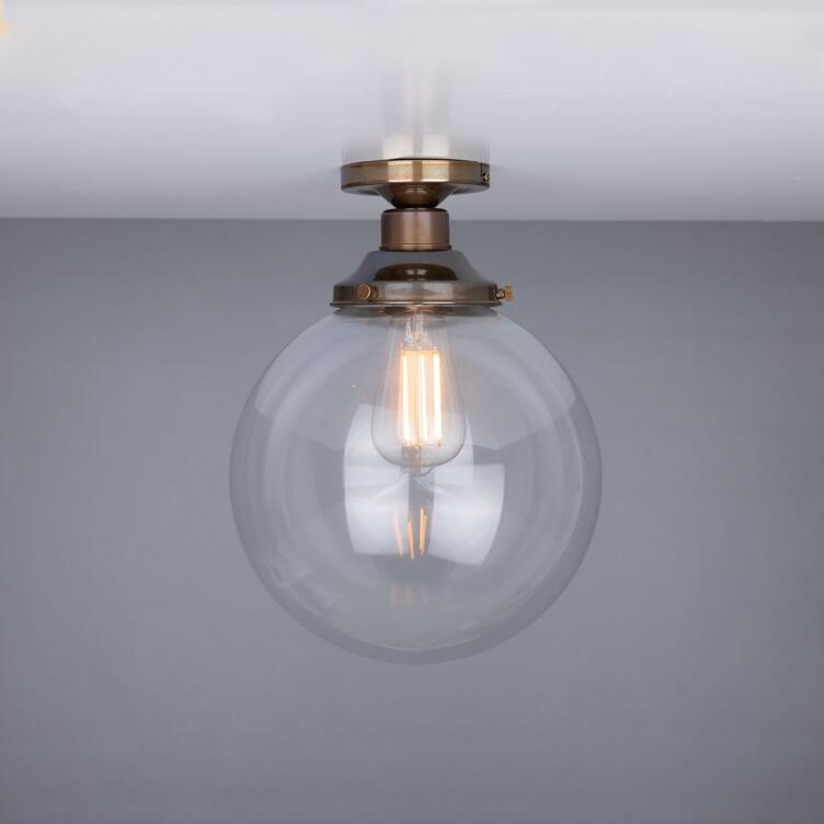 Riad Clear Glass Globe Flush Ceiling Light 25cm, Antique Brass